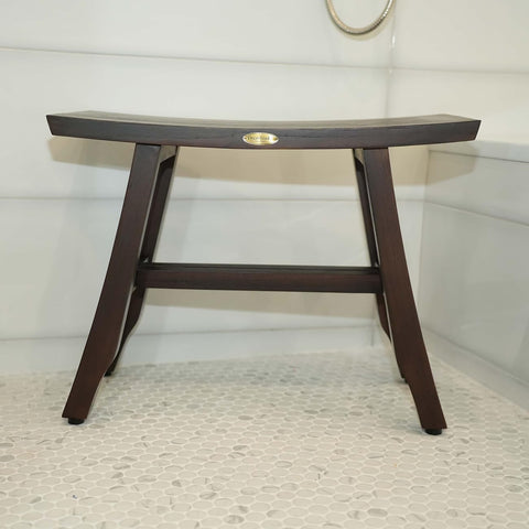 Satori Teak Shower Bench for Adults and Seniors, 24 Inch Compact Bath Seat with Brown Finish, on bathroom floor