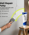 Person using Wall Repair Paste Kit For Cracks And Holes With Quick Drying Formula on cracked drywall with scraper