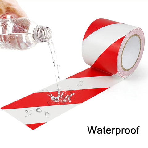 Water being poured on High Visibility Red And White Floor Marking Tape 4 Inch By 108 Feet Self Adhesive Waterproof Caution Strip