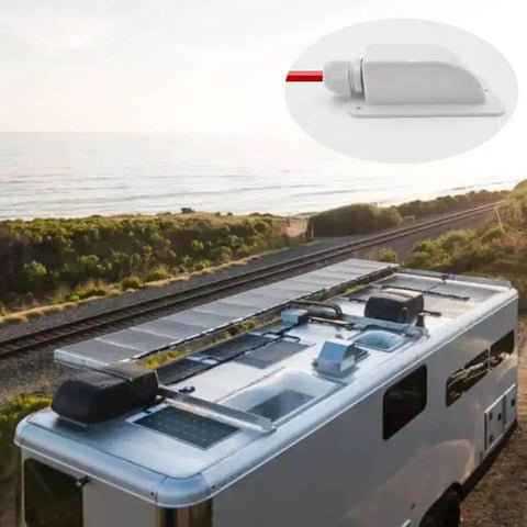White Weatherproof Solar Cable Entry Gland 2 Pack For All Cable Sizes 6mm2 To 12mm2 installed on camper van roof by the sea