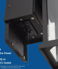 Close-up of GFCI outlet in Motion Sensor Outdoor Porch Light With GFCI Outlet Built In Black Exterior Wall Lantern Dusk To Dawn Sconce Lighting Fixture