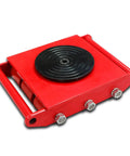 Heavy Workhorse Furniture Dolly And Steel Machine Skates With Six Ton Load Capacity Multi Directional Swivel Rollers viewed from above, featuring a red steel frame and rubber disc.