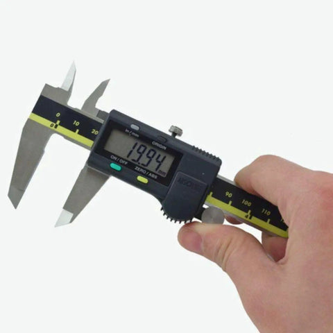 Hand holding 6 Inch Caliper With Absolute AOS Encoder, Ultra Accurate 0.0005 Inch, 0.01 mm Resolution, Pro Grade, Heavy Duty Stainless Steel