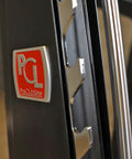 Close-up of Pro Clubline Counter Balanced Smith Machine logo with heavy duty safety stops, showcasing build quality.