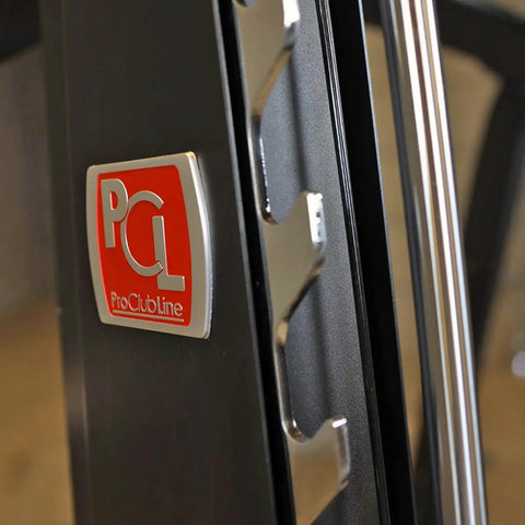 Close-up of Pro Clubline Counter Balanced Smith Machine logo with heavy duty safety stops, showcasing build quality.