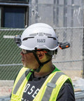 Worker wearing a hard hat equipped with a rechargeable portable cooling turbo fan for hard hats and safety helmets quiet 3-speed.