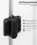 Close-up of black heavy-duty 2-pack adjustable tension gate hinges with caps for outdoor wood and metal gates. Designed for pool fences.