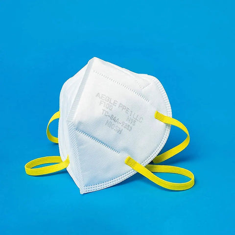 N95 Foldable Mask Pack USA Made NIOSH Approved 20 Count with white dome shape and yellow bands against blue background