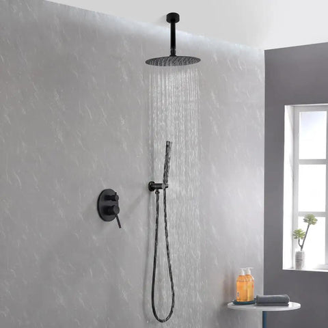 Shower System, 10" Rain Head, Handheld, Matte Black with Rough-In Valve mounted in modern bathroom with water flowing.