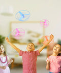 Children playing with 20 Sets Flying Helicopter Toys For Outdoors, hand spin rotating helicopters with colorful plastic propellers.