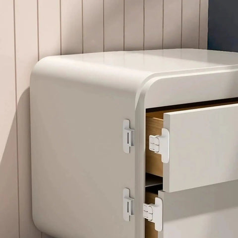 Sticky Mount Automatic Fridge Door Closers Set for cabinets and drawers locking mechanism installed on white cabinet corner