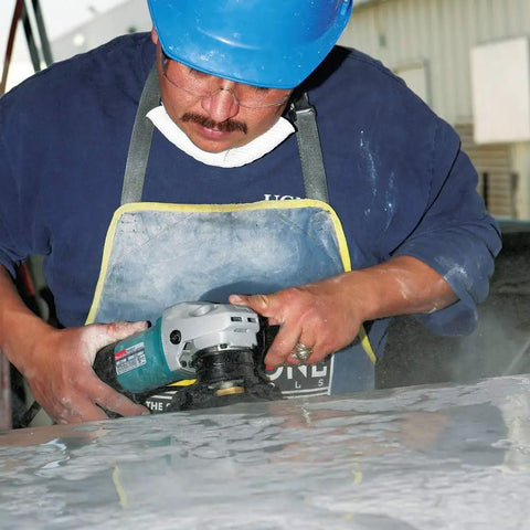 Worker using 4 Inch Electronic Stone Polisher with Variable Speed Control, Soft Start, and Constant Speed on marble surface