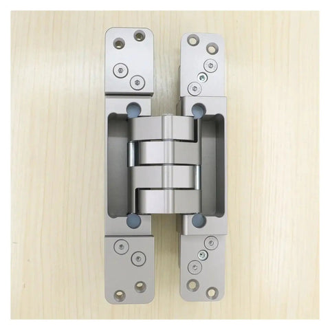 Heavy Duty Concealed Door Hinge For Rebated Doors, Invisible Hinge With Smooth, Effortless Operation, Durable Steel Build on wood surface