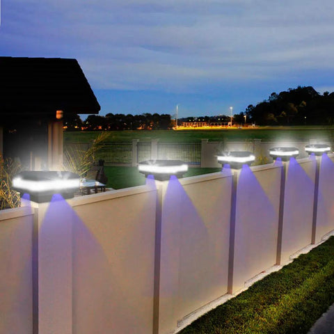Solar Post Cap Lights Outdoor No Wiring Deck Lighting 52 LED 160 Lumen illuminating fence at night