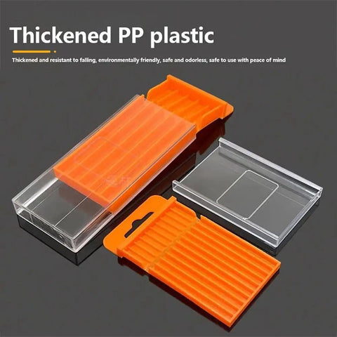 Orange Plastic Drill Bits Storage Box With Pull Out Design on dark surface, showcasing clear cover and orange tray insert.