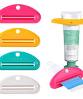 Four Pack Toothpaste Squeezers Hanging Tube Squeezer Tool Multicolor Tubular Paste Dispenser Save Every Last Drop For Toothpaste Facial Cleanser Creams And Paint Tubes showing different colors and usage