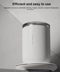 Heavy Duty Stainless Steel Self Stirring Heated Coffee Mug Electric Auto Mixing Cup Hits Three Sweet Temp Spots Keeps Your Morning Brew Piping Hot, with white brushed finish on a coaster.
