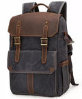 Front view of Rugged Batik Waterproof Canvas Camera Backpack With Large Capacity Main Camera Compartment And Anti Theft Rear Access Detachable Divider For Photo Gear Travel Daypack For Photographers.