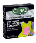 Tough As Nails Antibacterial Bandages For Elbows And Knees 3X3 Inch in a 10-pack box showcasing colorful designs.