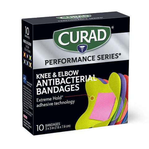 Tough As Nails Antibacterial Bandages For Elbows And Knees 3X3 Inch in a 10-pack box showcasing colorful designs.