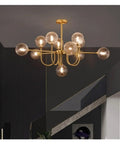 Nordic Minimalist Magic Bean LED Pendant Lamp French Glass Ball U-Shaped Chandelier with golden finish and multiple glass bulbs.