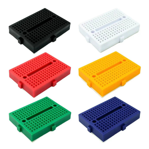 Set of six colorful mini breadboards from All In One Breadboard Kit For Quick Prototyping With Eight Boards Including Standard Half Size And Mini Breadboards In Six Colors For Arduino ESP32 ESP8266 And Raspberry Pi Projects