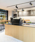 Lit 12W RGBW Track Light Heads With 16 Color Options And Independent Warm White Chip H Style Track Lighting in cafe