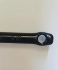 Close-up of the 152mm black arm of the One Piece Black Crankarm Set For Bikes Wide One Piece Crank To Crank Assembly Kit.