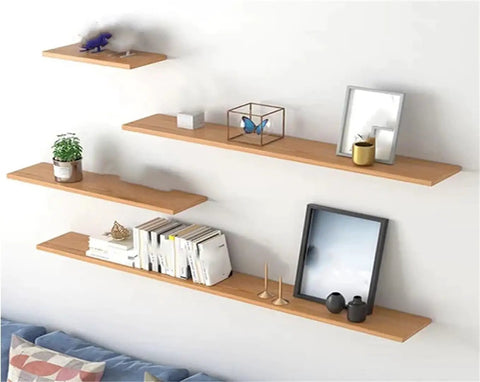 Floating wooden shelves supported by heavy duty hidden shelf bracket for wall mounts, showing adjustable use for home storage.