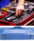 Hand reaching for tools on a workbench with Serious Workhorse Iron Tool Chest With Adjustable Telescoping Handle And Secure Padlock compatible lock.