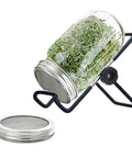 Straight Up Premium Stainless Steel Sprouting Lids And Stands For Wide Mouth Mason Jars To Grow Heckin Fresh Microgreens And Sprouts At Home With Rust Proof Mesh Discs And Solid Foldable Trays That Are Gonna Be Your New Kitchen Fav. Jar with sprouts on metal stand and stainless steel mesh lid.