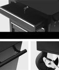 Close-up of Heavy Duty Rolling Tool Chest With Seven Deep Drawers showing an open drawer and lock system, black steel material.
