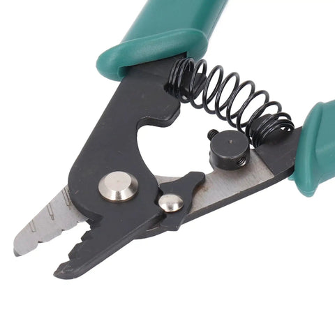 Heavy Duty 3 Hole Wire Stripper With Knockout Ergonomic Grip And Ridiculously Smooth Adjustable Aperture showing cutting blade and spring mechanism.