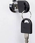 Close-up of locking mechanism with key on Heavy Duty Rolling Tool Cabinet With Secure Locking Casters And Thick Steel Frame For Garage Storage Organizer.