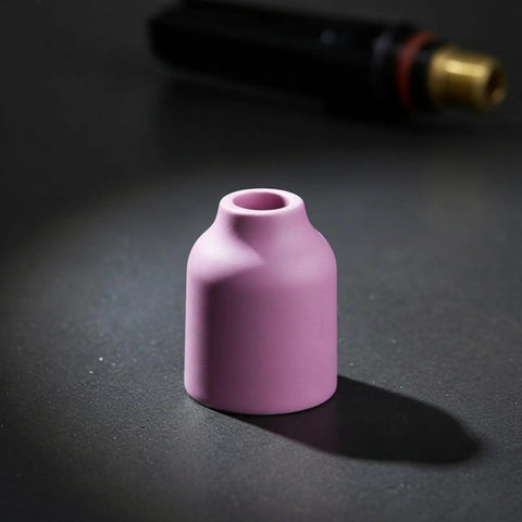 Pink ceramic nozzle cup from Heavy Duty Tig Torch Consumables Kit With Copper Collet Body And Clear Cup For Clean Welds.