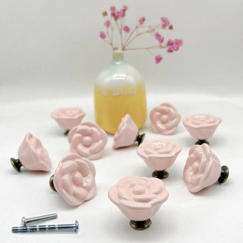 Grab This Dope 10 Piece Set Of Pink Rose Porcelain Cabinet Knobs Perfect For Dressing Up Drawers And Dressers. 1.4 Inch Ceramic Flower Handles feature M4 screws.