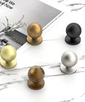 30 Pack 1 Inch Round Solid Ball Cabinet Knobs In Rich Champagne Bronze Finish Designed For Kitchen And Bathroom Drawer Pulls Delivering A Tight Fit And Dead Simple Setup With Zero Sweat Required with assorted finishes on marble background.
