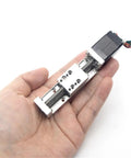 Premium Mini Linear Actuator Stage With Nema8 Ball Screw Slide Table For 100Mm Stroke held in hand showing compact design.
