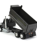 Black Western Star One Sixty Four Scale Die Cast Dump Truck with raiseable bed, free-rolling wheels, plastic and die-cast parts.