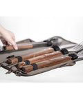 Stainless Steel BBQ Grill Tools Set With Ergonomic Wood Handles Includes Spatula Tongs Knife Fork And Carry Bag displayed open