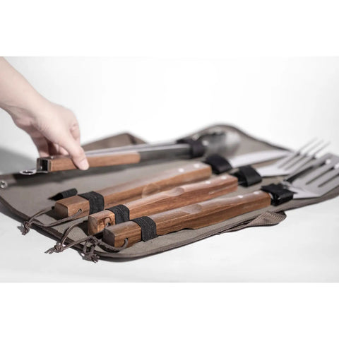 Stainless Steel BBQ Grill Tools Set With Ergonomic Wood Handles Includes Spatula Tongs Knife Fork And Carry Bag displayed open