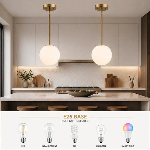 Mid Century Modern 1 Light Pendant Light With White Glass Globe Shade And Gold Finish Brushed Brass Fixture over kitchen island