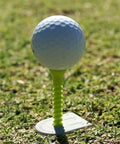 Golf ball on Driving Range Tee Holder With Flexible Tees That Stay Put On Grass Easy Adjustable Height For Consistent Tee Height