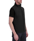 Men's Heavy Duty Softshell Vest With Smooth Four Way Stretch And Plush Fleece Lining, side view on model, water resistant, black.