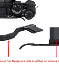 Close-up of Deluxe Metal Thumb Up Grip showing silicone pad for Fujifilm X Pro 3 X Pro 2 X Pro 1 with hot shoe mount and secure grip.