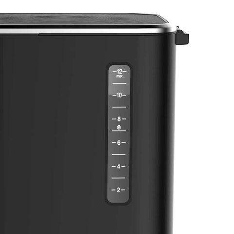 Side view of 12-Cup Touchscreen Coffee Maker With Glass Carafe, showing water level indicator for brew strength control.