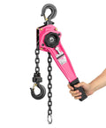 Lever Chain Hoist One And A Half Ton Capacity With Ten Foot Lift And Dual Heavy Duty Hooks Manganese Steel G80 Chain Double Pawl Brake Come Along For Warehouse Automotive Garages Pink Finish in use.