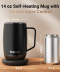 No App Hassle Self Heating Coffee Mug With Precise Temperature Control, 14 Oz Travel Cup next to a can for size comparison.
