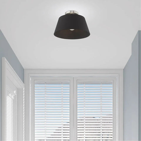 One Light Brushed Nickel Ceiling Mount Fixture With Black Accents in hallway, showcasing sleek modern design and easy installation.