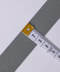 High Visibility Silver Reflective Sew On Fabric Tape Strips For Clothing Edging, 1 Inch By 20 Yards next to measuring tape